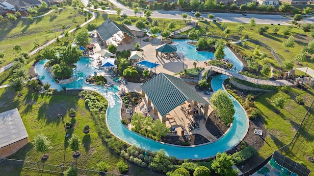 370 Grace Lilly Dr, Buda, TX 78610 - aerial overview of property's location featuring a pool area and nearby suburban area