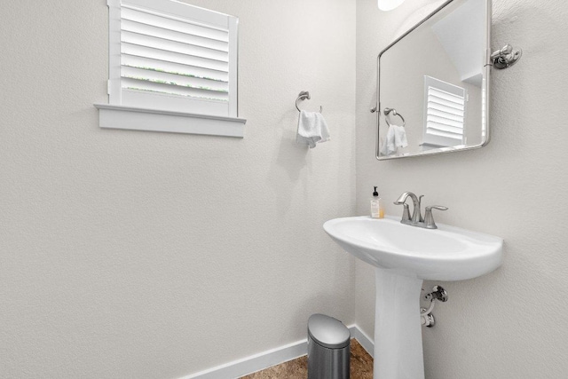 bathroom featuring baseboards