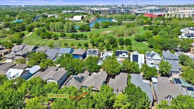 aerial view with a residential view and a water view