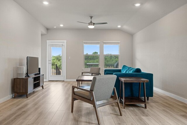 living area with recessed lighting, light wood-type flooring, and ceiling fan