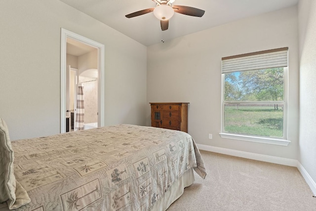 101 Dakota Dr, Georgetown, TX 78633 - bedroom featuring baseboards, light carpet, and a ceiling fan
