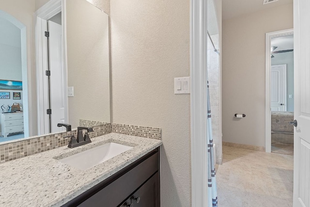 101 Dakota Dr, Georgetown, TX 78633 - full bathroom with vanity, baseboards, a shower with curtain, and tile patterned floors