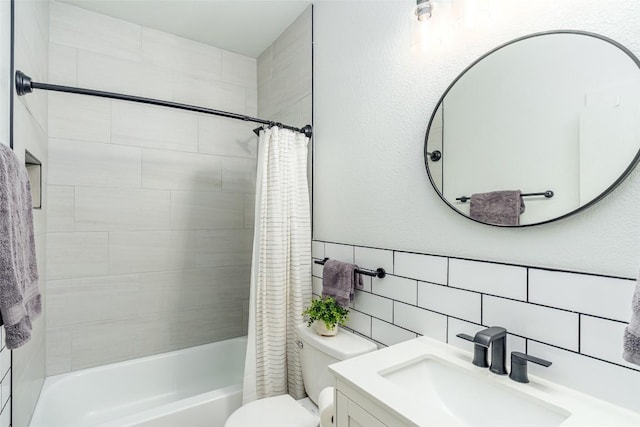 129 Aguilar Dr, Hutto, TX 78634 - bathroom featuring shower / tub combo, vanity, tile walls, and tasteful backsplash