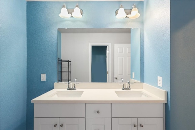 345 Coba St, Leander, TX 78641 - full bath featuring double vanity and a textured wall