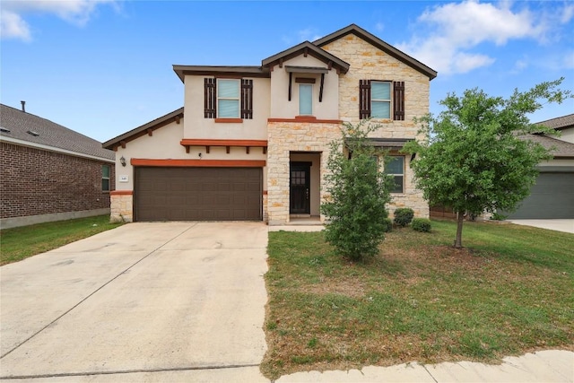 345 Coba St, Leander, TX 78641 - view of front of property featuring stone siding, driveway, stucco siding, and a front lawn
