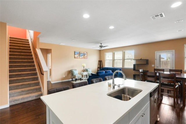345 Coba St, Leander, TX 78641 - kitchen with a sink, a ceiling fan, light countertops, recessed lighting, and dark wood-style floors