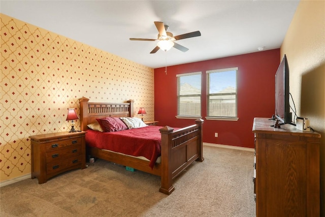 345 Coba St, Leander, TX 78641 - bedroom featuring light colored carpet, ceiling fan, baseboards, and wallpapered walls