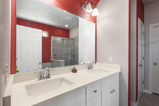 345 Coba St, Leander, TX 78641 - full bathroom with a stall shower and double vanity