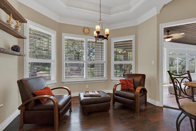 1164 Fairway Dr, Canyon Lake, TX 78133 - sitting room featuring crown molding, dark wood-style floors, ceiling fan with notable chandelier, and baseboards