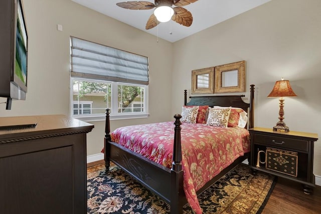 1164 Fairway Dr, Canyon Lake, TX 78133 - bedroom featuring wood finished floors, baseboards, and ceiling fan