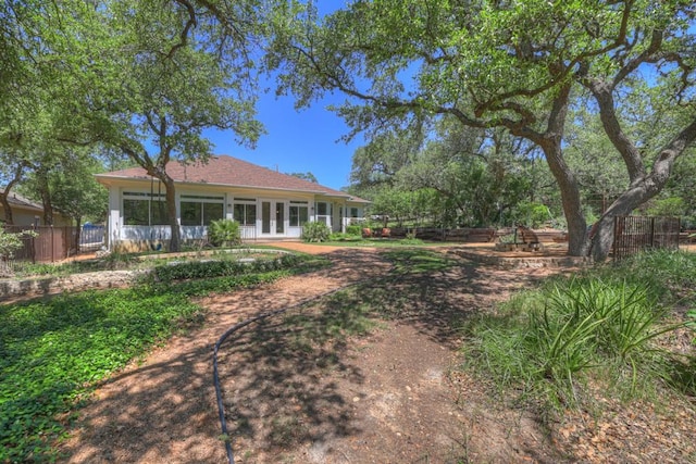 1164 Fairway Dr, Canyon Lake, TX 78133 - view of yard featuring fence and french doors