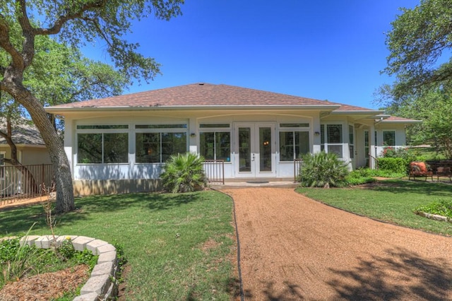1164 Fairway Dr, Canyon Lake, TX 78133 - exterior space featuring french doors, a lawn, fence, and driveway