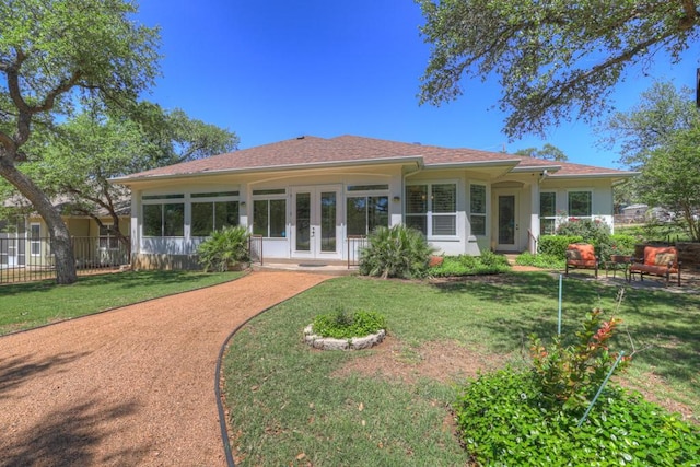 1164 Fairway Dr, Canyon Lake, TX 78133 - back of house with fence, french doors, and a yard