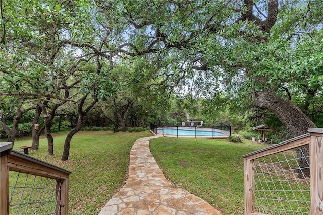 104 Tonkawa Cv, Kyle, TX 78640 - view of yard with an outdoor pool