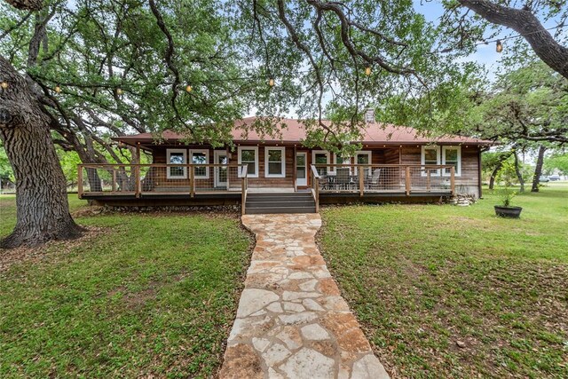 104 Tonkawa Cv, Kyle, TX 78640 - view of front of house with a front lawn