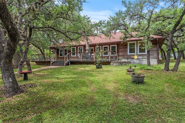 104 Tonkawa Cv, Kyle, TX 78640 - rear view of property with a yard