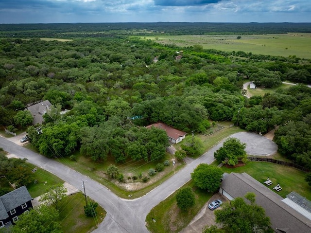 104 Tonkawa Cv, Kyle, TX 78640 - drone / aerial view featuring a wooded view