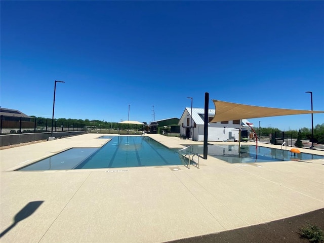 2700 Shimsham Dr, Pflugerville, TX 78660 - community pool with fence and a patio area