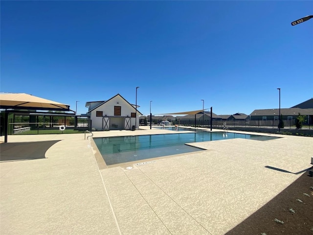 2700 Shimsham Dr, Pflugerville, TX 78660 - community pool featuring fence, a gazebo, and a patio