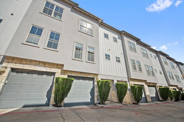 view of building exterior with an attached garage