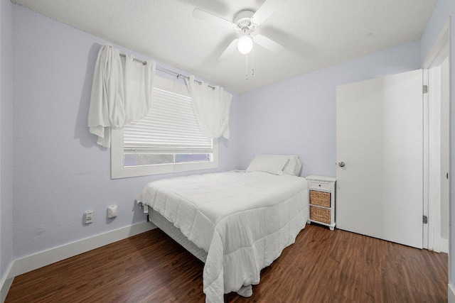 3212 Darnell Dr, Austin, TX 78745 - bedroom featuring wood finished floors and a ceiling fan