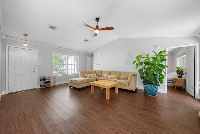 3212 Darnell Dr, Austin, TX 78745 - living room featuring a ceiling fan, dark wood-style floors, lofted ceiling, and ornamental molding