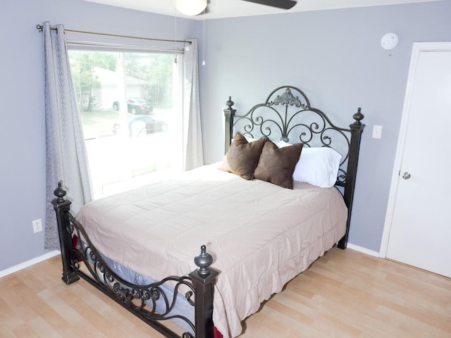 1015 Acanthus St, Pflugerville, TX 78660 - bedroom with wood finished floors, baseboards, and a ceiling fan