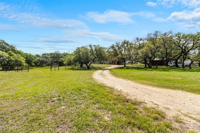 7557 Chaparral Rd, Killeen, TX 76542 - view of community with a rural view, a lawn, and driveway