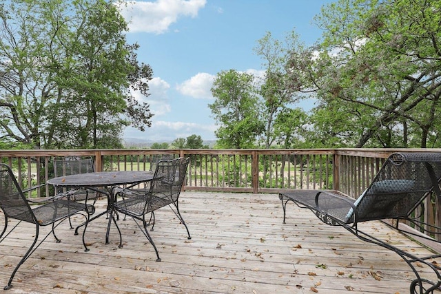 deck featuring outdoor dining space