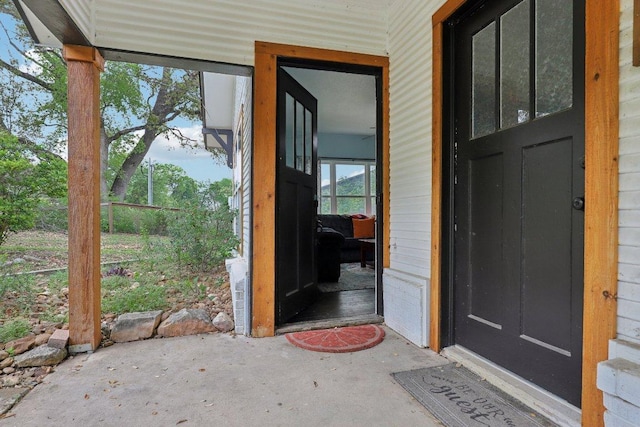 entrance to property with a patio area