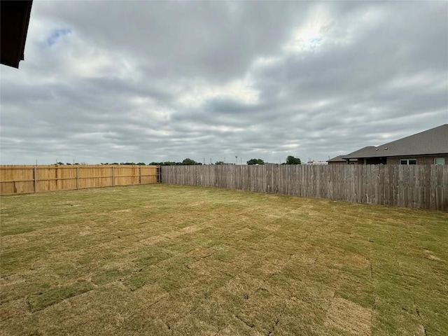view of yard featuring fence