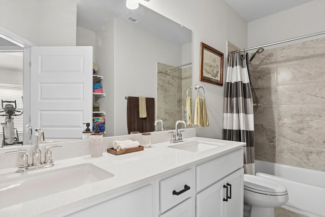 185 Dogvane Cir, Kyle, TX 78640 - bathroom with double vanity and shower / tub combo