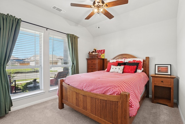 185 Dogvane Cir, Kyle, TX 78640 - bedroom with carpet, baseboards, lofted ceiling, and ceiling fan