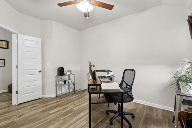 185 Dogvane Cir, Kyle, TX 78640 - office with a ceiling fan, wood finished floors, baseboards, and lofted ceiling