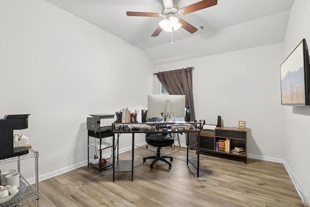 185 Dogvane Cir, Kyle, TX 78640 - home office with ceiling fan, wood finished floors, baseboards, and lofted ceiling