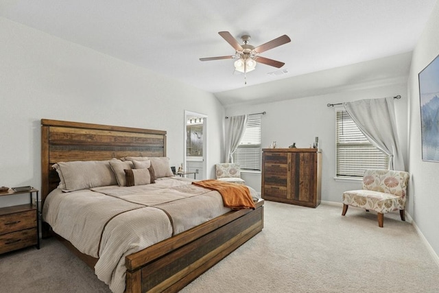 185 Dogvane Cir, Kyle, TX 78640 - bedroom with light colored carpet and a ceiling fan