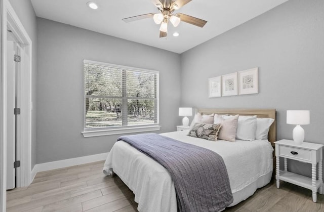 23315 Nameless Rd, Leander, TX 78641 - bedroom with baseboards, recessed lighting, and wood finished floors