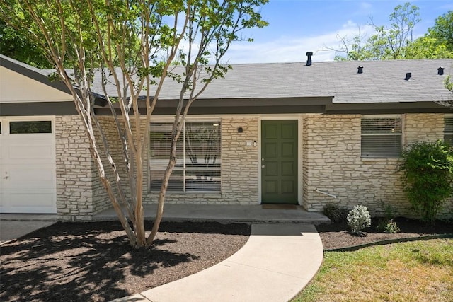 view of front of home with stone siding