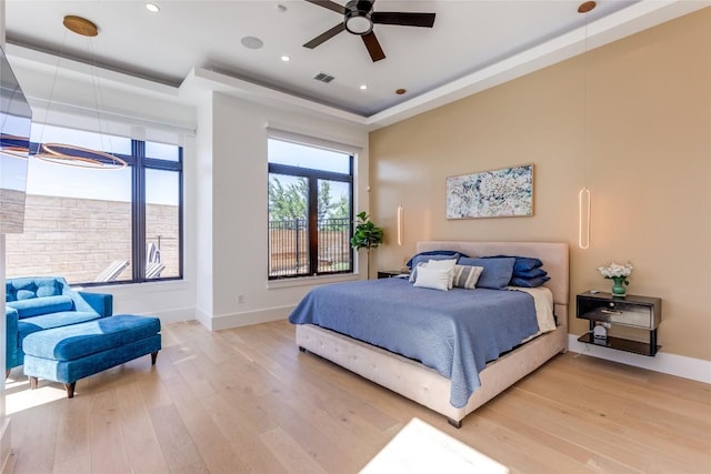 116 Mesones Rd, Florence, TX 76527 - bedroom featuring a tray ceiling, light wood finished floors, recessed lighting, and a ceiling fan
