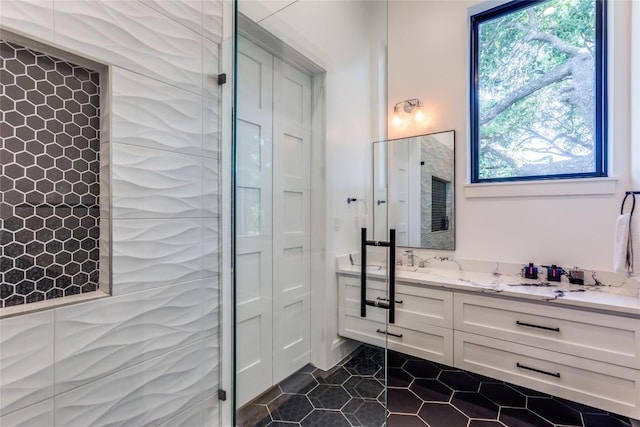 bathroom featuring tile patterned floors and vanity