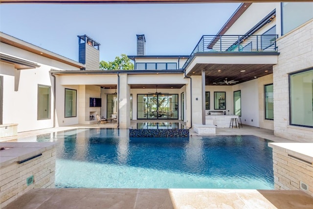 116 Mesones Rd, Florence, TX 76527 - view of swimming pool with ceiling fan, a patio, and a pool with connected hot tub