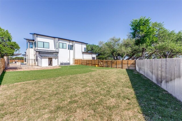 view of yard with a fenced backyard