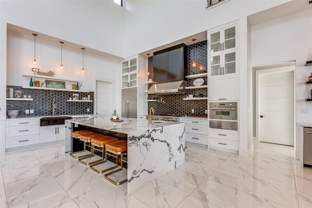 kitchen featuring decorative backsplash, oven, and open shelves