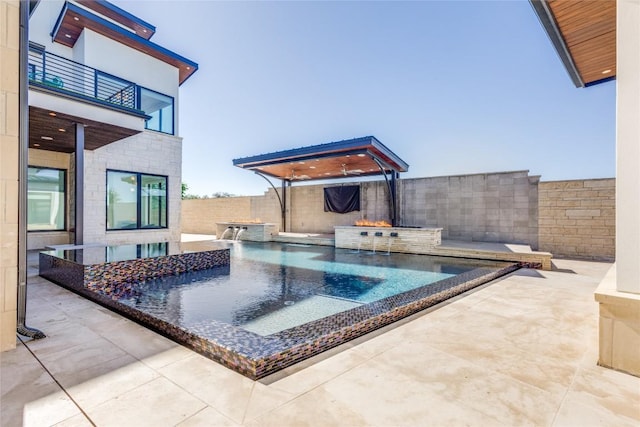 view of pool with a fenced in pool, a patio, a fenced backyard, and a jacuzzi