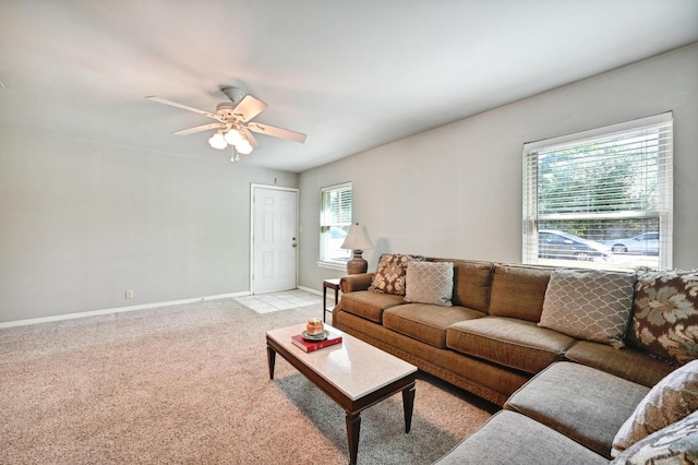 4722 Frontier Trl, Austin, TX 78745 - living area with baseboards, ceiling fan, and light carpet