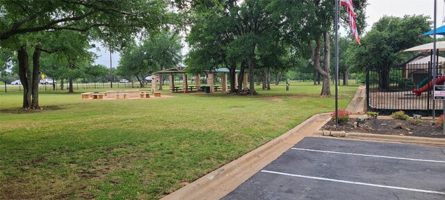 3817 E Newland Dr, Round Rock, TX 78681 - view of green lawn featuring a gazebo and a playground