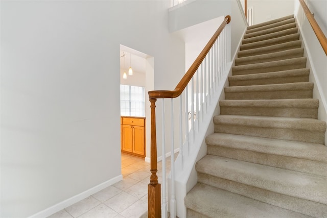 3817 E Newland Dr, Round Rock, TX 78681 - stairs with tile patterned flooring and baseboards