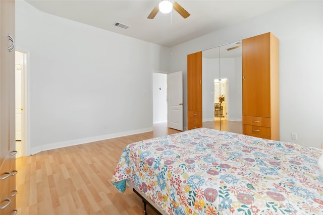 3817 E Newland Dr, Round Rock, TX 78681 - bedroom with wood finished floors, ceiling fan, a closet, and baseboards