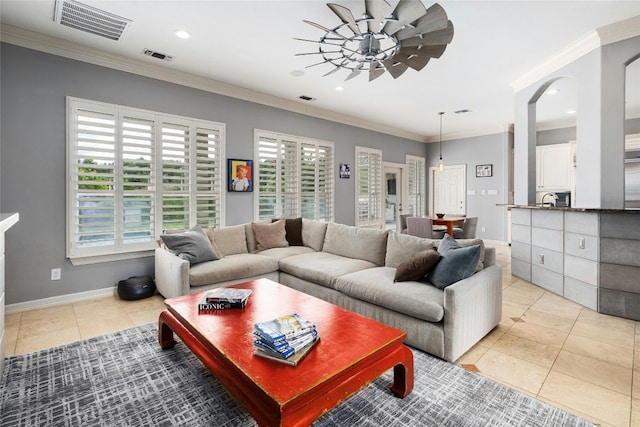 4101 Top Of Texas Trl, Austin, TX 78735 - living room with light tile patterned floors, recessed lighting, ceiling fan, and ornamental molding