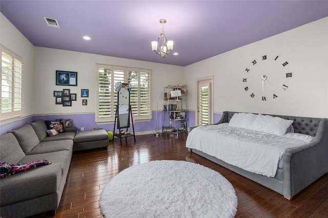 4101 Top Of Texas Trl, Austin, TX 78735 - bedroom with multiple windows, a chandelier, hardwood / wood-style flooring, and recessed lighting